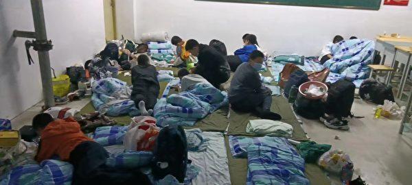 Students at Renze No. 2 School in Hebei Province stay in one room, with no beds and no restroom, during the school lockdown that started on Oct. 21, 2022. (Provided by anonymous parent)