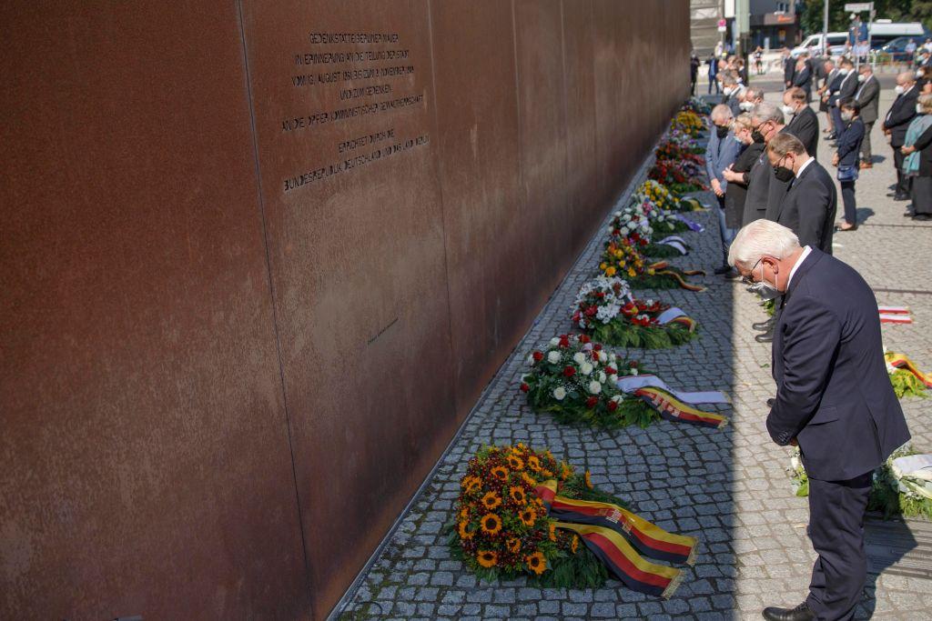 German President Frank-Walter Steinmeier lays a wreath at a memorial to victims of the Berlin Wall on the 60th anniversary of the construction of the Wall on Aug. 13, 2021 in Berlin. The Berlin Wall, built by the communist authorities of then East Germany in 1961, surrounded West Berlin and was meant to stop people in East Germany, and especially East Berlin, from fleeing into West Berlin. The Berlin Wall fell in 1989 and heralded the collapse of communist governments across Eastern Europe. (Courtesy of Carsten Koall/Getty Images)