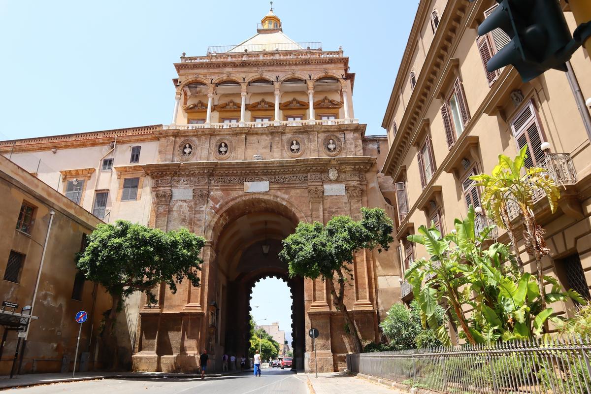 Porta Nuova was built to celebrate Charles V's conquest of Tunis and his subsequent visit to Palermo, and still stands today as the monumental city gate. (Walter Cicchetti/Shutterstock)
