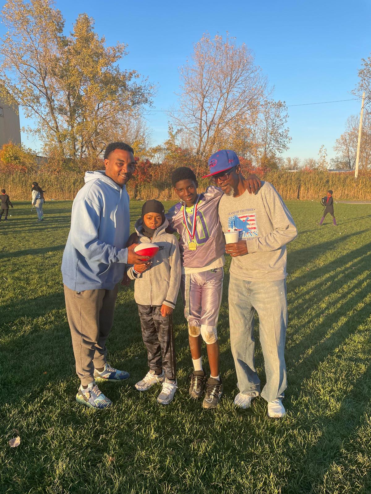 (L-R) Bryant Brown Jr, Romello "Mello" Early, Melvin Anderson, and Wesley Anderson after Melvin's football game. (Courtesy of <a href="https://www.facebook.com/bryantb2">Bryant Brown Jr.</a>)