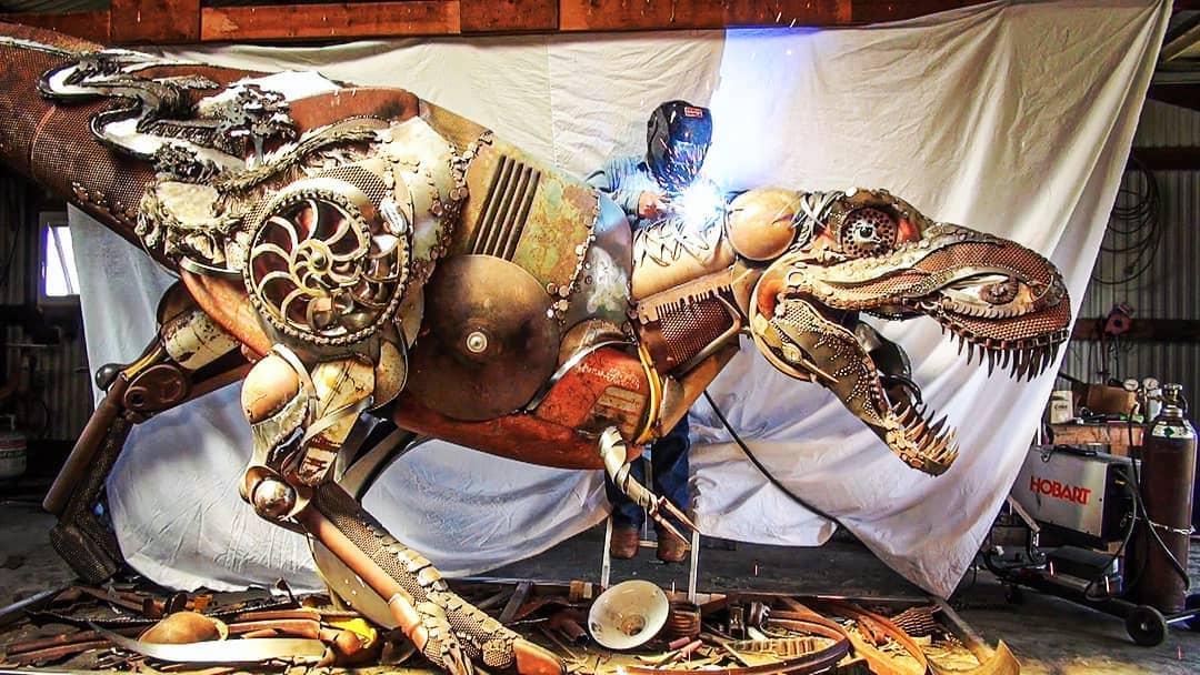 John Lopez welds a scrap metal T-rex. (Courtesy of <a href="https://www.instagram.com/johnlopezstudio/">John Lopez</a>)