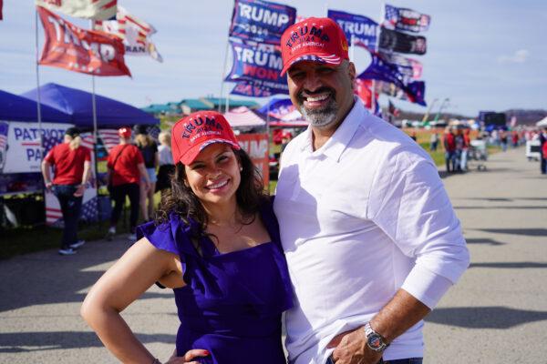 Maryland residents Michael Cabrera and Leslie Linan drove three hours to attend the "Save America" rally in Latrobe, Pa., on Nov. 5, 2022. (William Huang /The Epoch Times)