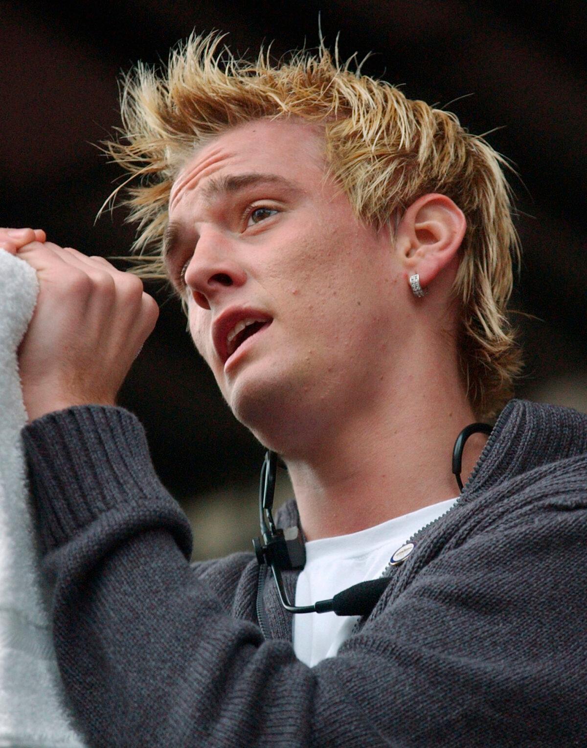 Singer Aaron Carter sings to a crowd during a First Night celebration at Government Center in Boston on Dec. 31, 2004. (Lisa Poole/AP Photo)