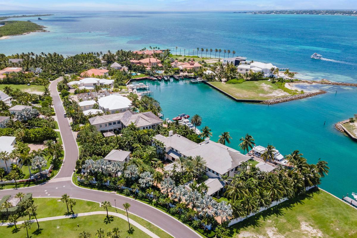 Set in the private Ocean Club Estates community on Paradise Island, the property features ocean-access dockage for yachts up to 120’ LOA. (Courtesy of Damianos Sotheby’s International Realty)