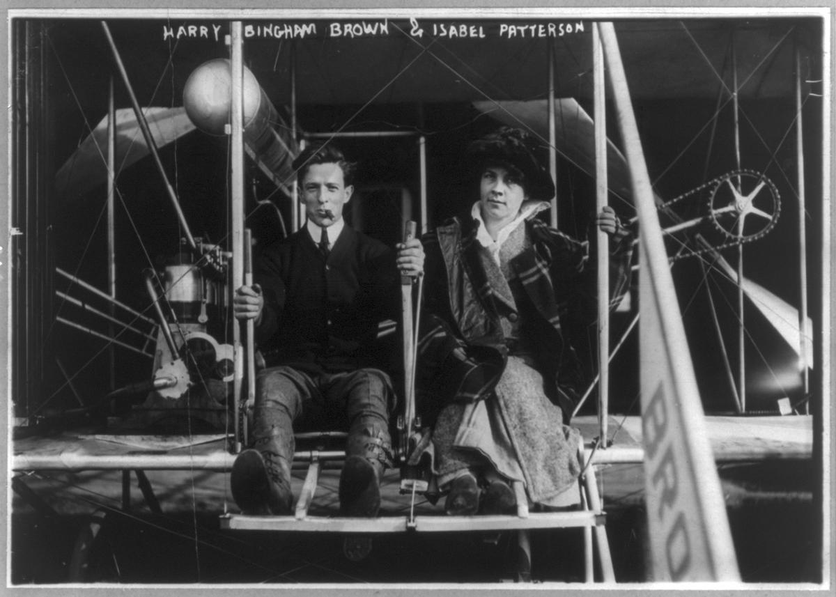 Harry Bingham Brown and Isabel Paterson (her name misspelled on the photo) pose on the airplane after breaking the American altitude record at Staten Island, Nov. 6, 1912. (Public Domain)