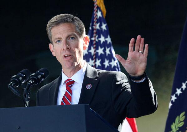 Democratic congressional candidate Mike Levin (D-Calif.) speaks with dignitaries and employees at ViaSat on Nov. 4, 2022 in Carlsbad, Calif. (Sandy Huffaker/Getty Images)