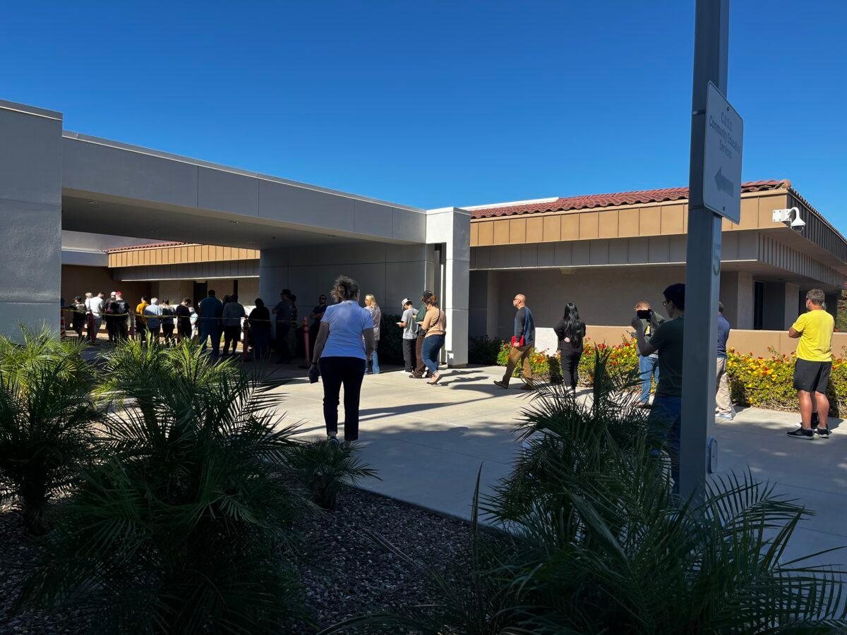 Arizona voters wait in line at Chandler Unified School District Office on Nov. 8. (Katie Spence/The Epoch Times)