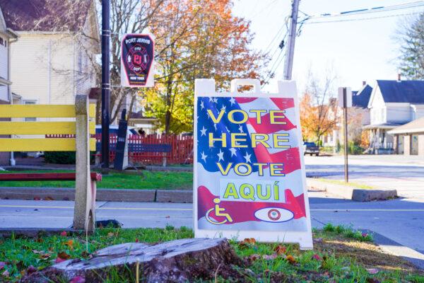 A voting sign outside Neversink fire engine company in Port Jervis, N.Y., on Nov. 8, 2022. (Cara Ding/The Epoch Times)