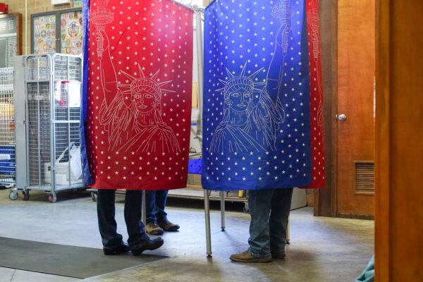 Residents cast their vote at Neversink fire engine company in Port Jervis, N.Y., on Nov. 8, 2022. (Cara Ding/The Epoch Times)