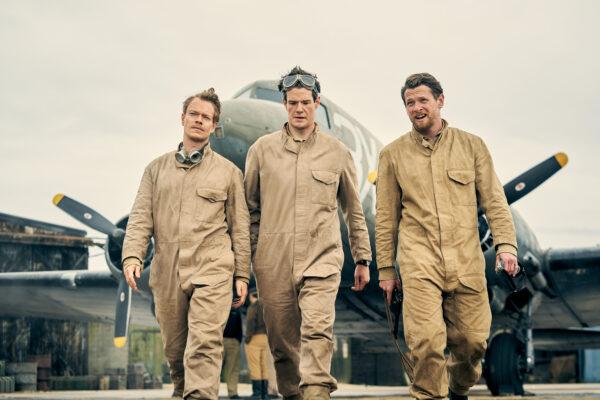 (L–R) Lt. Jock Lewes (Alfie Allen), David Stirling (Connor Swindells), and Paddy Mayne (Jack O’Connell) conduct hit-and-run raids on Axis air fields, in "Rogue Heroes." (Expix)