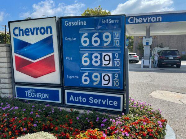 Gas prices are advertised at a Chevron station, as rising inflation and oil costs affect consumers, in Los Angeles on June 13, 2022. (Lucy Nicholson/Reuters)