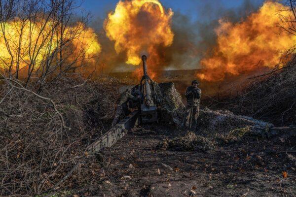 A Ukrainian soldier of an artillery unit fires toward Russian positions outside Bakhmut, eastern Ukraine, on Nov. 8, 2022. (Bulent Kilic/AFP via Getty Images)