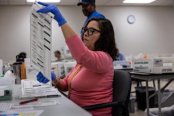 Election workers sort ballots at the Maricopa County Tabulation and Election Center on November 09, 2022, in Phoenix, Arizona. (John Moore/Getty Images)