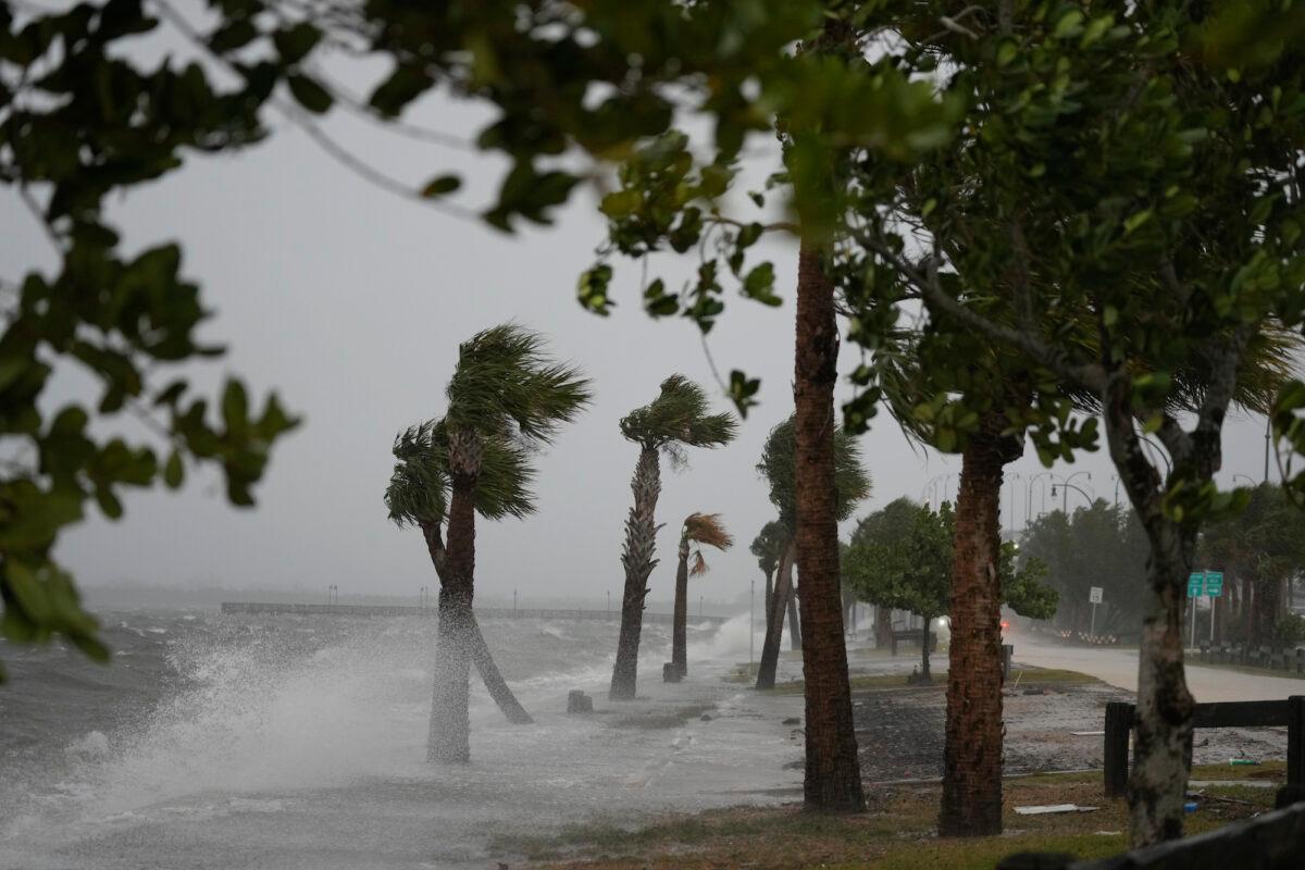 Waves crash on the shoreline along the Jensen Beach Causeway, as conditions deteriorate with the approach of Hurricane Nicole, in Jensen Beach, Fla., on Nov. 9, 2022. (Rebecca Blackwell/AP Photo)