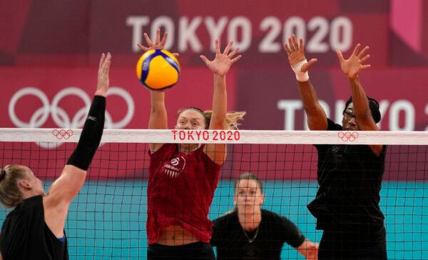 The U.S. women's volleyball team practices during a team training session at Ariake Arena during the 2020 Summer Olympics in Tokyo, on July 22, 2021. (Frank Augstein/AP Photo)