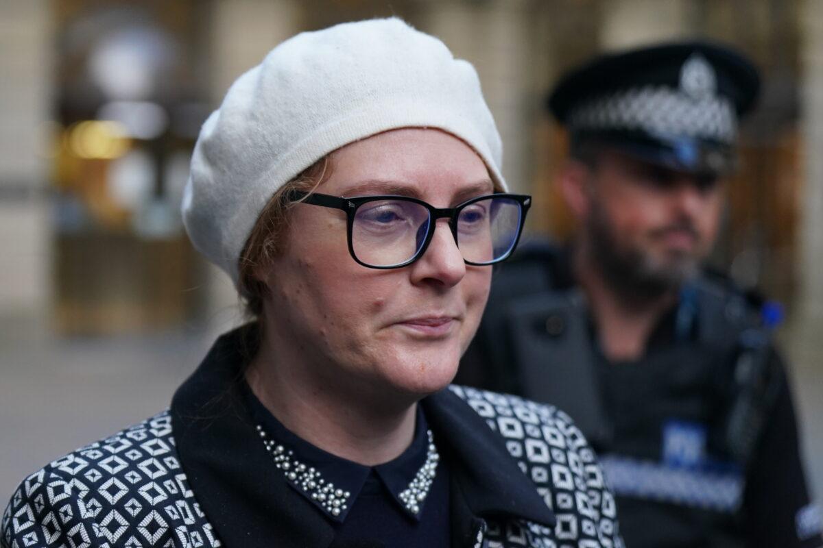 Miranda Knight, wife of the defendant, leaving a hearing on the extradition of Nicholas Rossi, who claimed to be Arthur Knight, to the United States, at Edinburgh Sheriff and Justice of the Peace Court in Scotland on Nov. 9, 2022. (Jane Barlow/PA Media)