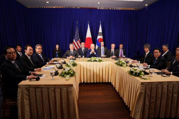 U.S. President Joe Biden holds a trilateral meeting with Japanese Prime Minister Fumio Kishida and South Korean President Yoon Suk-yeol in Phnom Penh, Cambodia, on Nov. 13, 2022. (Kevin Lamarque/Reuters)