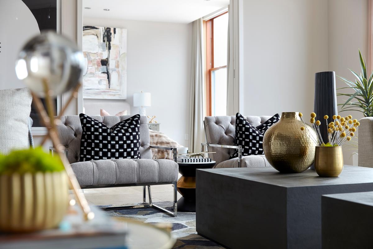 An abundance of black and white accessories adds a sense of luxury and richness to this living space. (Scott Gabriel Morris/TNS)
