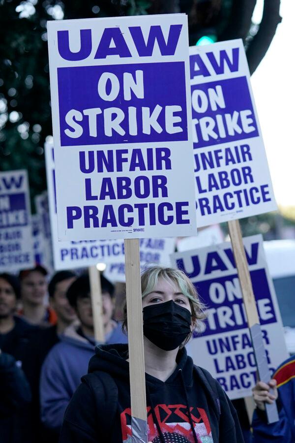 People take part in a protest outside of the University of California San Francisco medical offices in San Francisco, Nov. 14, 2022. Nearly 48,000 unionized academic workers at all 10 University of California campuses have walked off the job Monday. (Jeff Chiu/AP Photo)