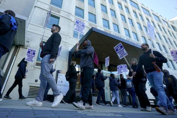 People take part in a protest outside of the University of California San Francisco medical offices in San Francisco, Nov. 14, 2022. Nearly 48,000 unionized academic workers at all 10 University of California campuses have walked off the job Monday. (Jeff Chiu/AP Photo)