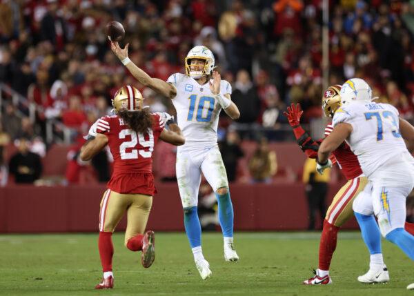 Justin Herbert (10) of the Los Angeles Chargers throws a pass during the third quarter against the San Francisco 49ers San Francisco 49ers beat the Los Angeles Chargers at Levi's Stadium in Santa Clara, Calif., on Nov. 13, 2022. (Ezra Shaw/Getty Images)