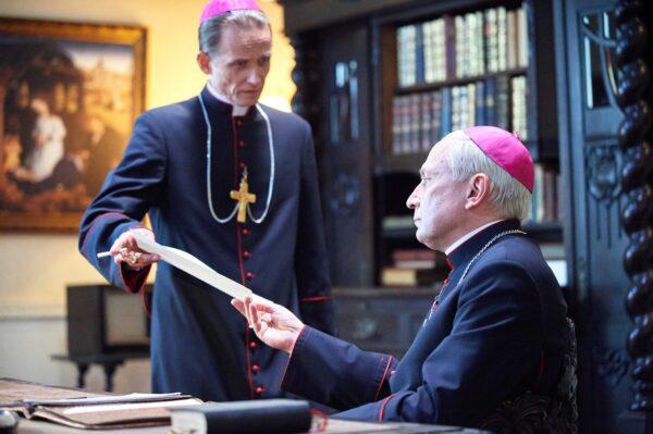 Bishop Baraniak (Tomasz Sapryk, L) with Cardinal Wszynski (Slowomir Grzymkowski), in "Prophet." (prophet2022)