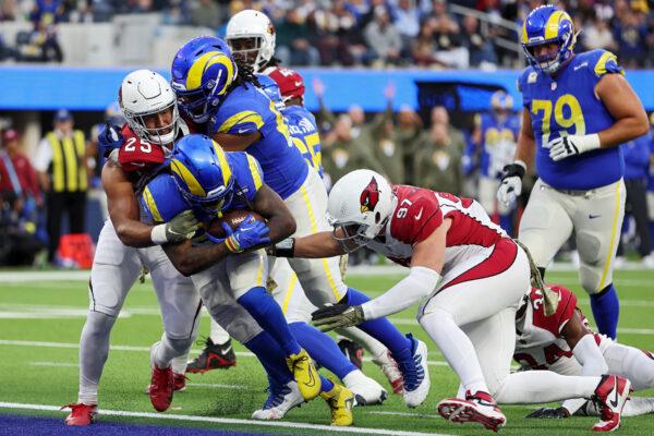 Darrell Henderson Jr. (27) of the Los Angeles Rams scores a rushing touchdown in the third quarter of the game against the Arizona Cardinals at SoFi Stadium in Inglewood, Calif., on Nov. 13, 2022. (Sean M. Haffey/Getty Images)