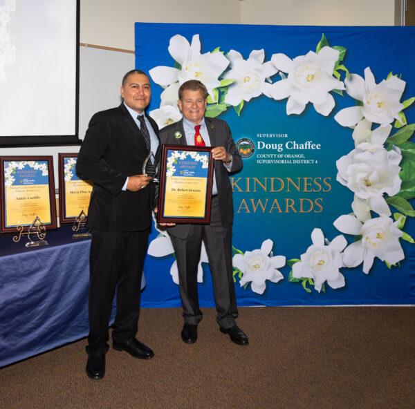 Orange County Board of Supervisors Chairman Doug Chaffee (R) awards Dr. Robert Ornelas at the fourth Annual Fourth District Kindness Awards ceremony in Fullerton, Calif., on Nov. 13, 2022. (Courtesy of the Office of Chairman Doug Chaffee)