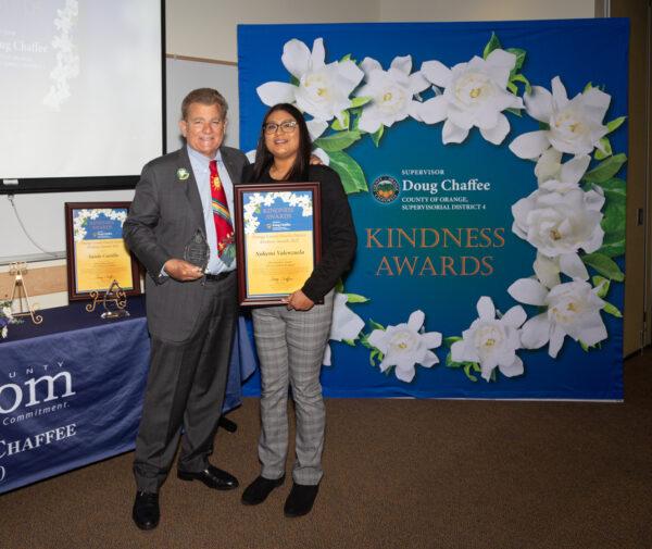 Orange County Board of Supervisors Chairman Doug Chaffee awards Nohemi Valenzuela at the Fourth District Kindness Awards ceremony in Fullerton, Calif., on Nov. 13, 2022. (Courtesy of the Office of Chairman Doug Chaffee)