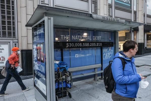 A Peterson Foundation billboard displaying the national debt is pictured on 11th Street in downtown Washington, D.C., on Feb. 8, 2022. (Jemal Countess/Getty Images for Peter G. Peterson Foundation)