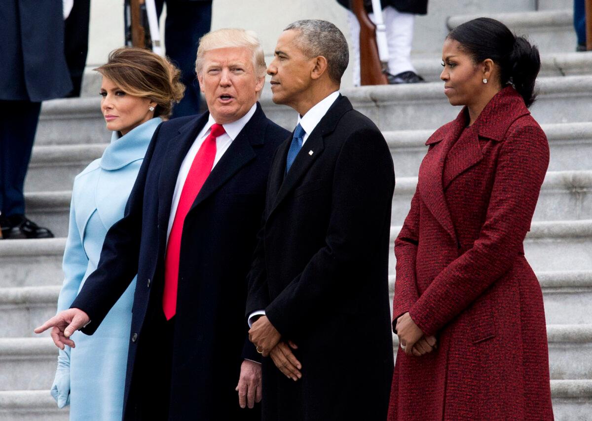 President Donald Trump (2nd-L) First Lady Melania Trump (L), former President Barack Obama (2nd-R) and former First Lady Michelle Obama walk together following the inauguration, on Capitol Hill in Washington, on Jan. 20, 2017. (Kevin Dietsch/Getty Images)