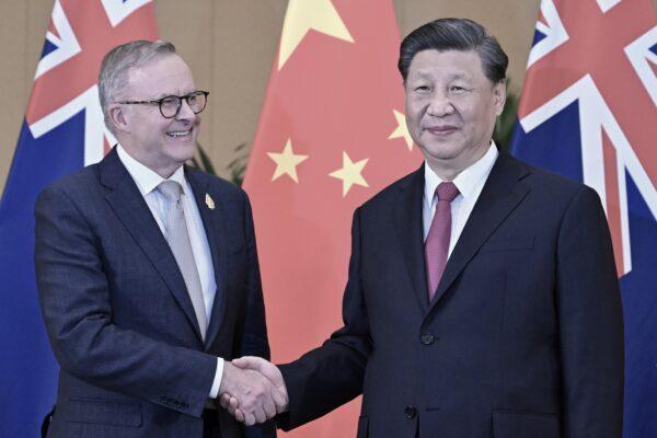Australia’s Prime Minister Anthony Albanese meets China’s President Xi Jinping in a bilateral meeting during the 2022 G20 summit in Nusa Dua, Bali, Indonesia, on Nov. 15, 2022. Mr. Albanese will travel to Beijing from Nov. 4 to 7 (AAP Image/Mick Tsikas)