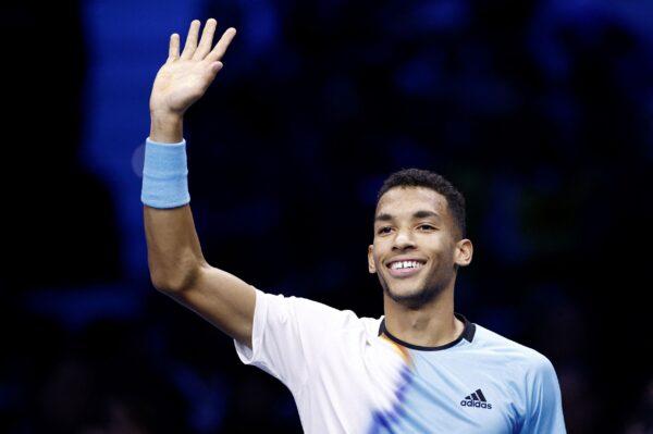 Canada's Felix Auger Aliassime celebrates winning his group stage match against Spain's Rafael Nadal during the ATP Finals in Pala Alpitour, Turin, Italy, on Nov. 15, 2022. (Guglielmo Mangiapane/Reuters)