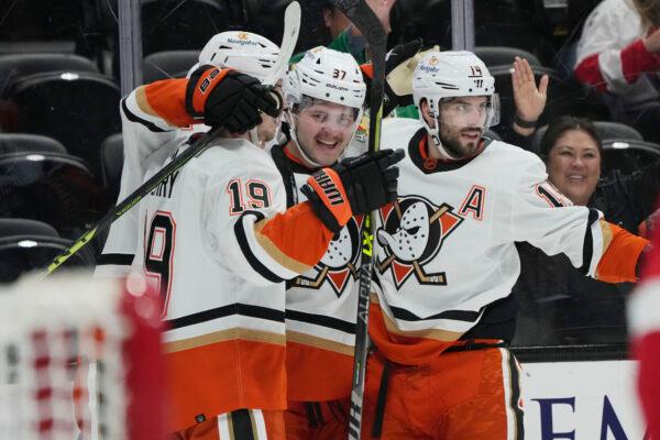 Anaheim Ducks center Mason McTavish (37) celebrates his goal with teammates during the first period of an NHL hockey game against the Detroit Red Wings in Anaheim, Calif., on Nov. 15, 2022. (Marcio Jose Sanchez/AP Photo)