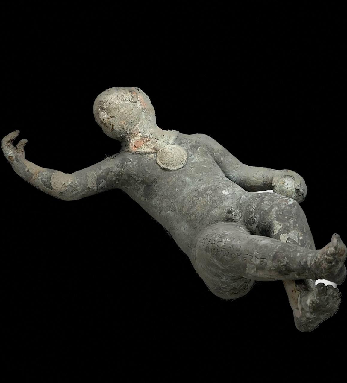 A 2,300-year-old bronze statue depicts the figure of a boy. (Ministero della Cultura/Handout via Reuters)