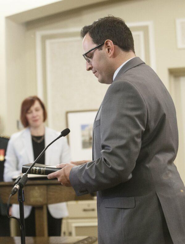 Demetrios Nicolaides, minister of advanced education, is sworn into office in Edmonton on April 30, 2019. (The Canadian Press/Jason Franson)