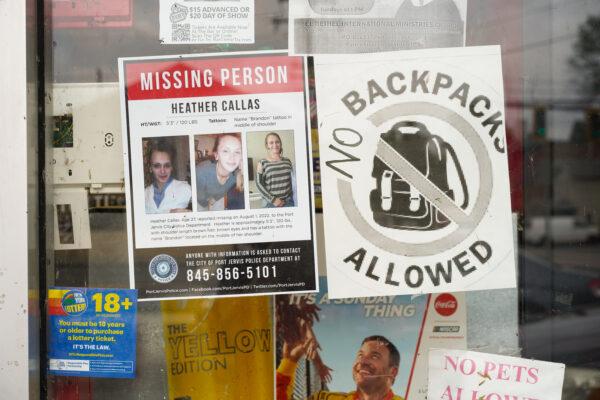 A missing person poster of Heather Callas is seen on a community board outside a gas station in Cudderbackville, N.Y., on Sept. 5, 2022. (Cara Ding/The Epoch Times)