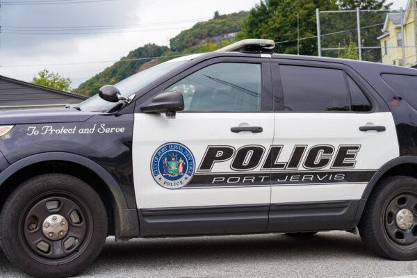 A police squad car parks outside the Port Jervis Police Department in Port Jervis, N.Y., on Sept. 5, 2022. (Cara Ding/The Epoch Times)