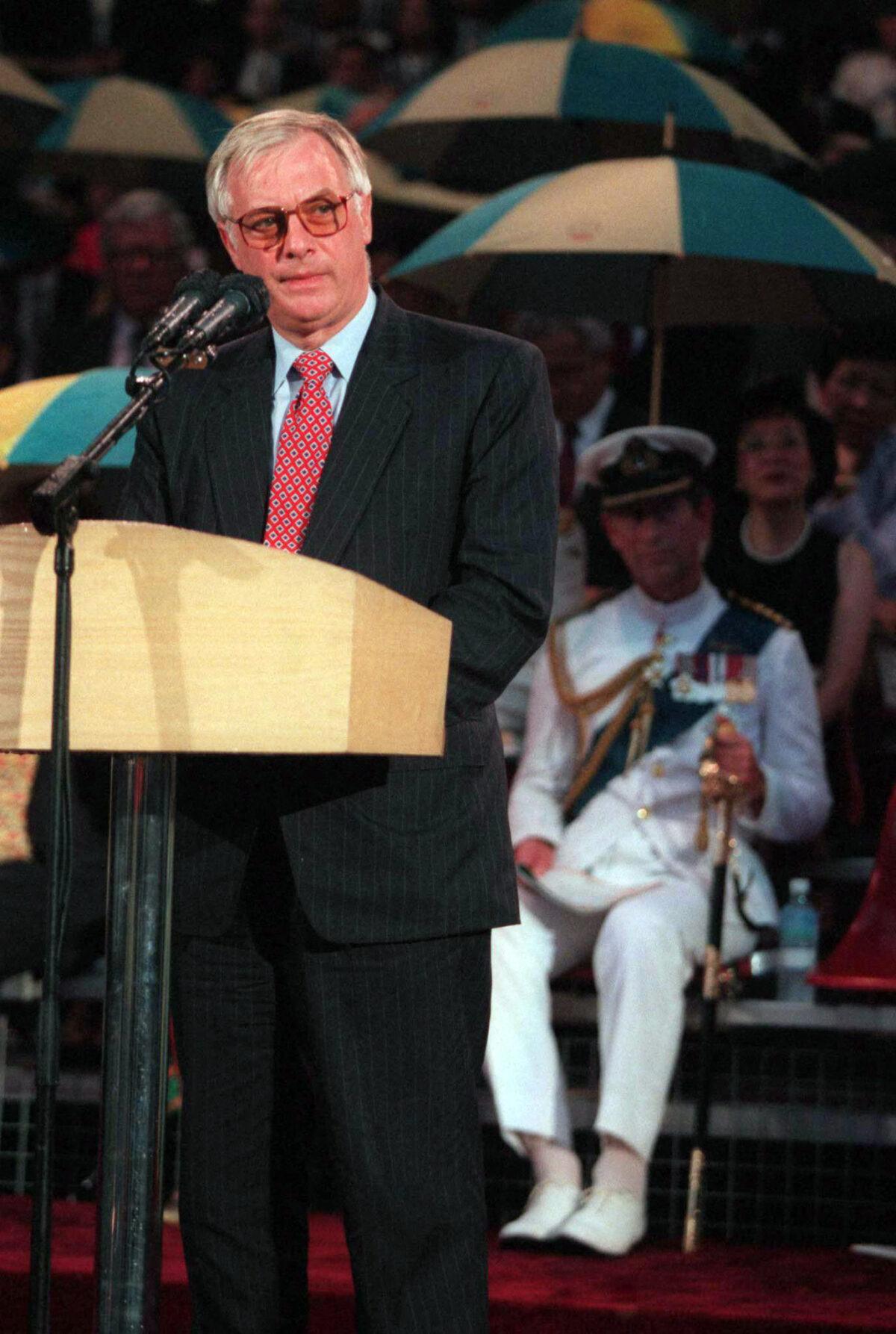 Chris Patten delivers his farewell speech at the British Handover Ceremony, while Prince Charles looks on 30 June. AFP PHOTO POOL/Mike Fiala (Photo by Mike FIALA / POOL / AFP)