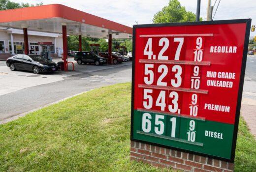 A sign displays gas prices at a gas station in Falls Church, Virginia, July 19, 2022. (SAUL LOEB/AFP via Getty Images)