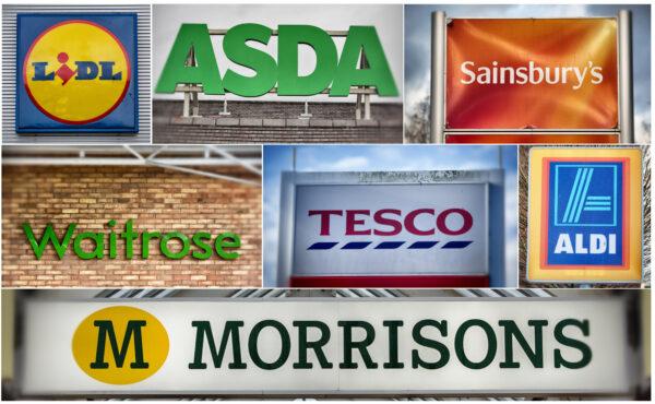 The logos of the UK's leading supermarkets, Lidl, Asda, Sainsbury's, Waitrose, Tesco, Aldi, and Morrisons, are displayed outside various branches in Bristol, England, on Nov. 18, 2015. (Matt Cardy/Getty Images)