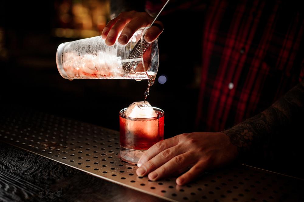 Pour over a large ice cube to maintain the drink's chill. (Maksym Fesenko/Shutterstock)