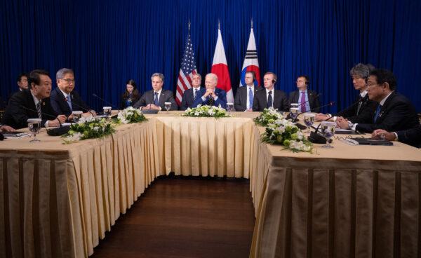 South Korean President Yoon Suk-yeol (L) speaks during a trilateral meeting with U.S. President Joe Biden (C) and Japanese Prime Minister Fumio Kishida (R) on the sidelines of the East Asia Summit during the 40th and 41st Association of Southeast Asian Nations (ASEAN) Summits in Phnom Penh, Cambodia, on Nov. 13, 2022. (Saul Loeb/AFP via Getty Images)