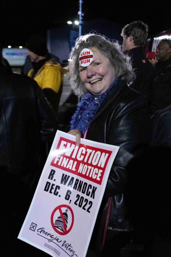 A Herschel Walker supporter at a Senate runoff rally in Gainesville, Ga. on Nov. 17, 2022, at which Walker and Sen. Lindsey Graham (R-S.C.) spoke. (Photo courtesy of Justin Kase Photography.)