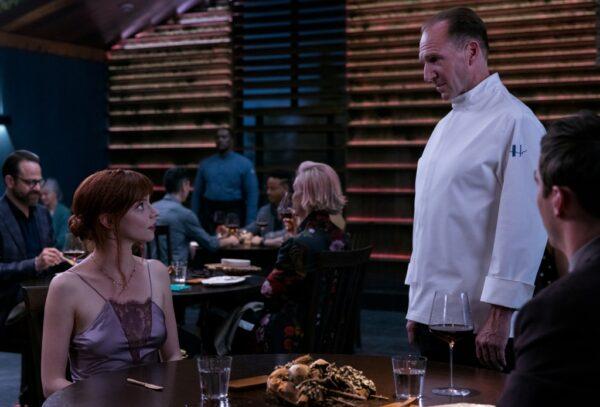Margot Mills (Anya Taylor-Joy) speaks to Julian Slowik (Ralph Fiennes), the uber chef in "The Menu." (Searchlight Pictures)