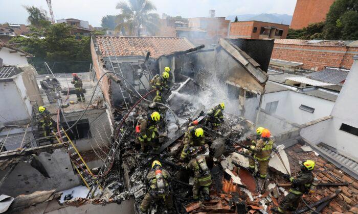 Small Plane Crashes in Colombian Neighborhood; 8 Dead