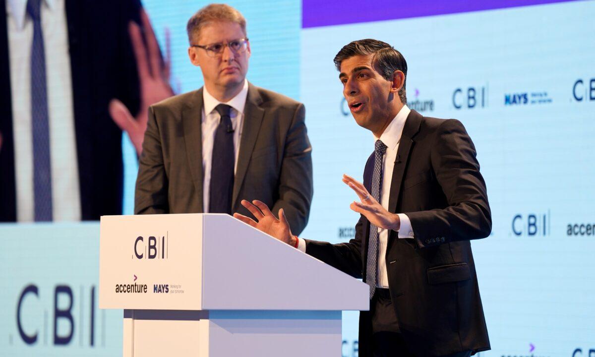 Tony Danker, director-general of the CBI, watches Prime Minister Rishi Sunak speaking during the CBI annual conference at the Vox Conference Centre in Birmingham, England, on Nov. 21, 2022. (Jacob King/PA Media)