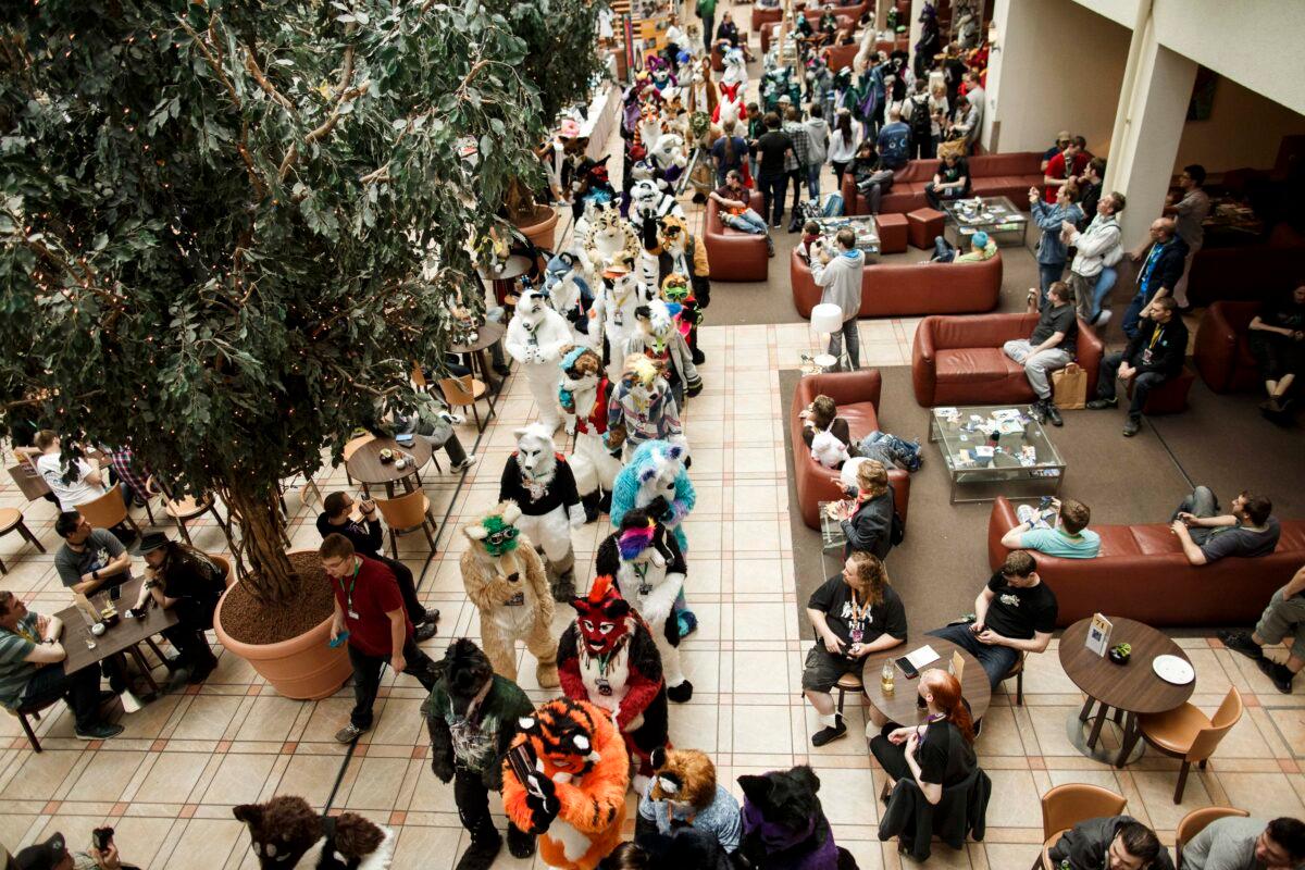 Furries, as they prefer to be called, walk through a hotel lobby in Berlin, Germany, during the 2016 Eurofurence gathering of 2,500 participants from around the world. (Carsten Koall/Getty Images)