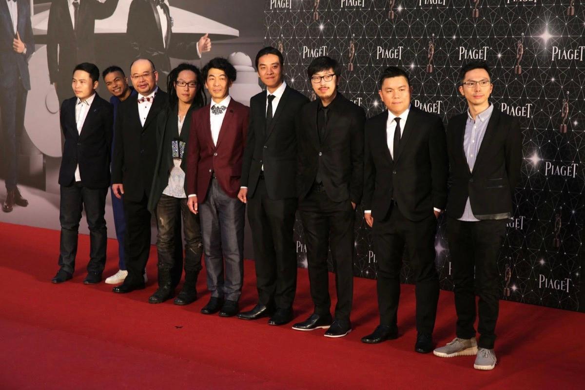 The cast and crew of the controversial Hong Kong film "Ten Years," posing on the red carpet at the 35th Hong Kong Film Awards on April 3, 2016. (Isaac Lawrence/AFP)
