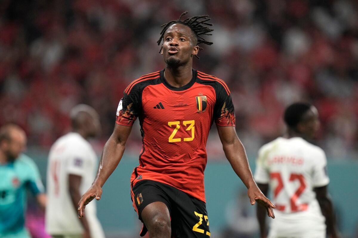 Belgium's Michy Batshuayi celebrates after scoring his side's opening goal during the World Cup group F soccer match between Belgium and Canada, at the Ahmad Bin Ali Stadium in Doha, Qatar, on Nov. 23, 2022. (Hassan Ammar/AP Photo)